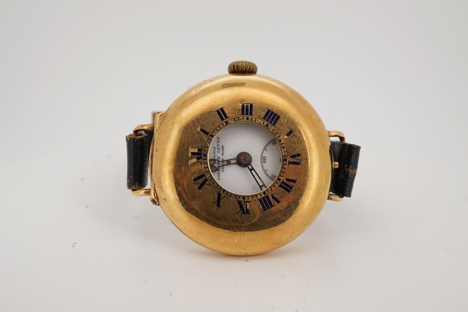 A gentleman's early to mid 20th century 18ct gold half hunter Coventry lever manual wind wrist watch